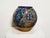 Beautiful vintage Moroccan pottery vase from Safi, known for its traditional hand-painted ceramics. Features a rounded...