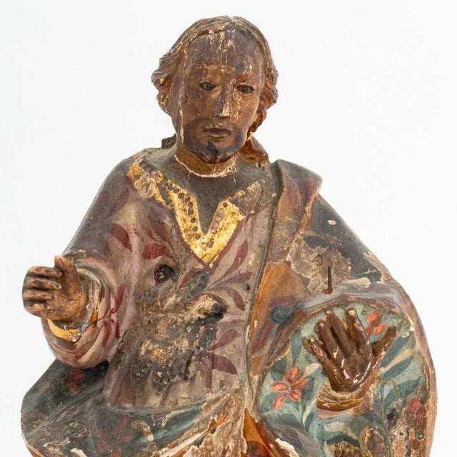 Standing Saint Polychrome Painted and Carved Wood Sculpture, 19th century, probably Spanish Colonial, with hand-painted...