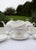 Antique French white porcelain tea set with fine gold details, dating from the late 19th century. The initials P.B. are...