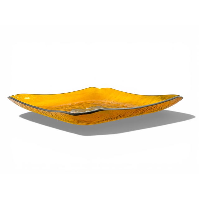 Unique find from Georges Briard- a slumped amber glass fruit tray featuring a silver grape bunch in the center. Measures...