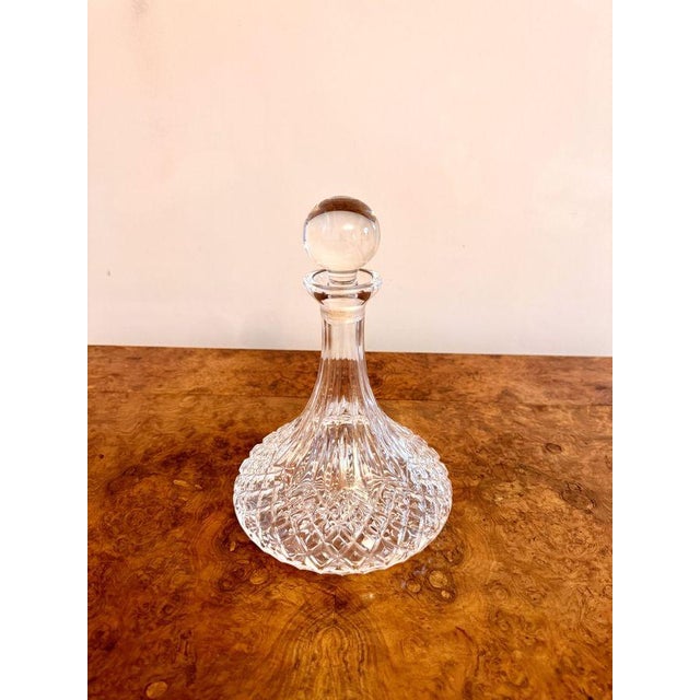 Antique Edwardian quality cut glass ships decanter having a quality shaped cut glass ships decanter with the original...