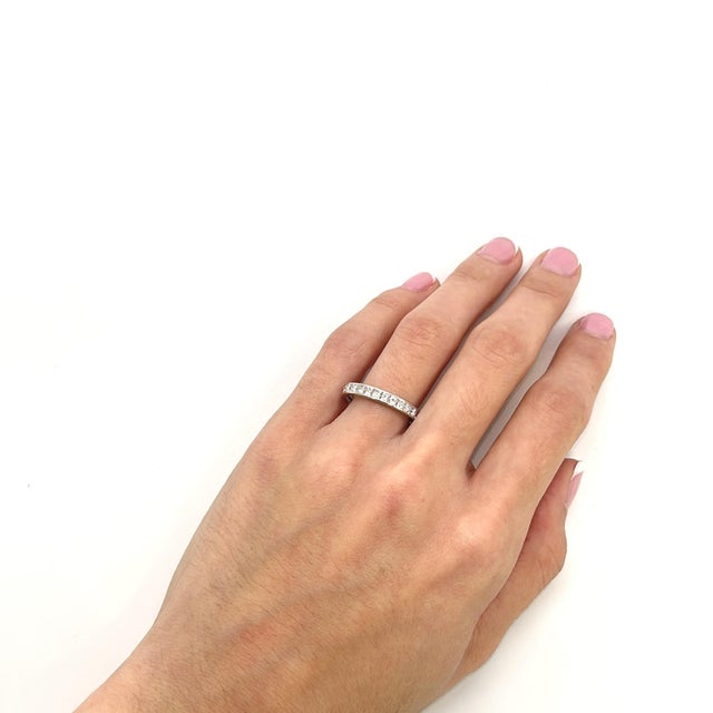This is an 18k White Gold Eternity Band with Princess Cut Diamonds. - Stone Info - 27x - 2.25mm ~0.08ct xVS1/E Diamond...