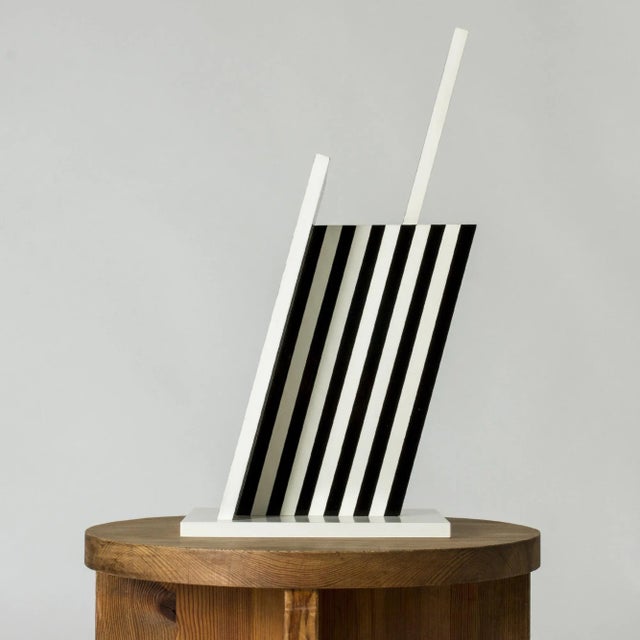 Striking sculpture by Lars Erik Falk, made from composite wood and tilted at Falk’s signature 73 degrees. Painted in a...
