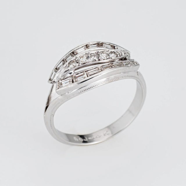 This is part of Chairish’s Fine Jewelry assortment. Stylish vintage mixed cut diamond ring (circa 1950s to 1960s) crafted...