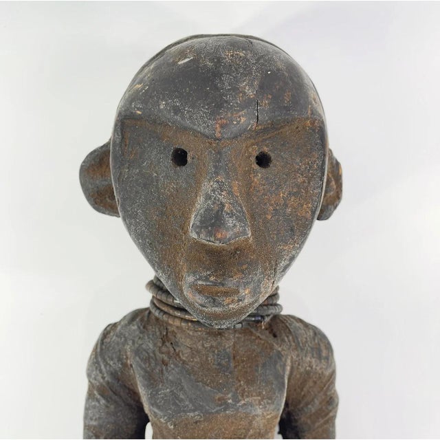 The Pere figure is made from wood, and wrapped in leather and fabric, and sealed with a substance. The Pere Figure,...