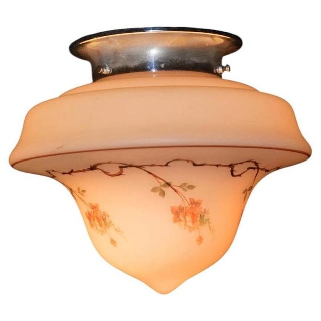 A charming original art deco ceiling pendant dating to the 1930s, distinguished by its unusually shaped decorative glass...