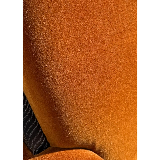 A rare find — a matched pair of custom-built cigar lounge chairs upholstered in carnelian mohair. These were commissioned...