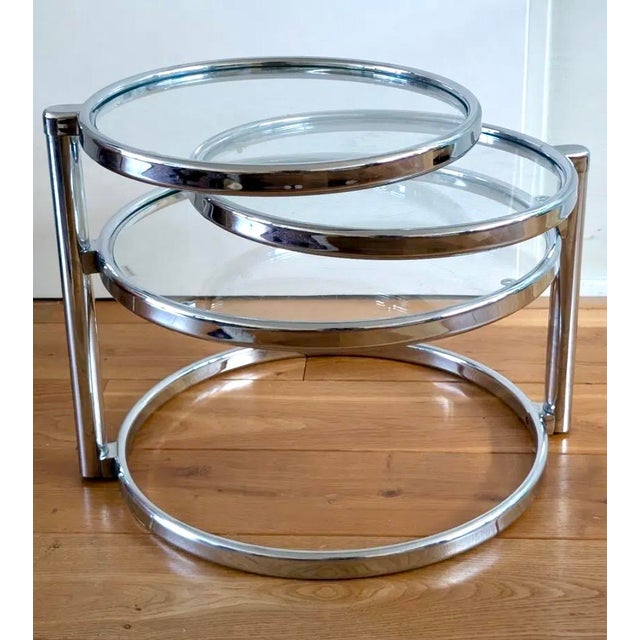 The stunning leitmotiv lm621 coffee table, emblematic of the 1980s space age aesthetic, boasts a striking silhouette, a...