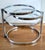 The stunning leitmotiv lm621 coffee table, emblematic of the 1980s space age aesthetic, boasts a striking silhouette, a...
