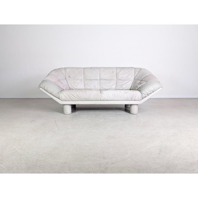 Offering a cool vintage three-seater leather sofa. The piece is reminiscent of designs by Burkhardt Vogtherr, although our...