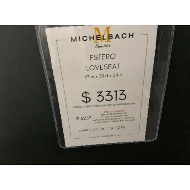 Like new showroom model, MSRP is approx $6,000. Estero loveseat, features a modern design with two loose back and seat...