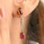 This is part of Chairish’s Fine Jewelry assortment. Natural Ruby Diamond Drop Earrings in 18K Gold to make a statement...