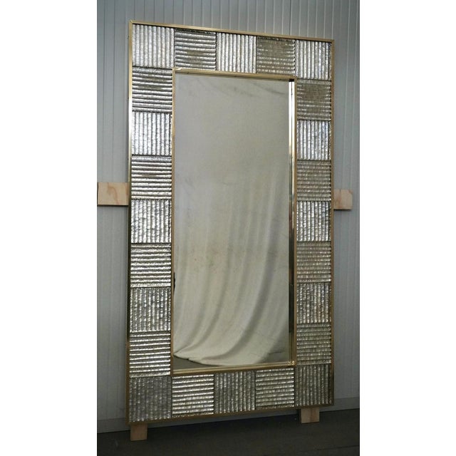 A sturdy silver frame captures the gaze of those who observe it, leaving them in ecstasy. The Murano furnaces create an...
