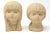 A set of two hand-carved stone/composite sculptures, in the forms of a girl's head and boy's head. Good vintage condition....