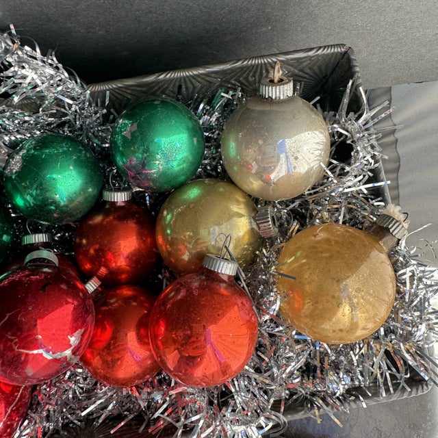 Lot of Shiny Brite ornaments. Includes 13 ornaments of varying sizes. There are some 1 1/2” and 2 1/2” ornaments. Some are...