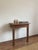 A charming pair of antique rustic pine console tables or side tables, France, late 19th to early 20th century. Each table...