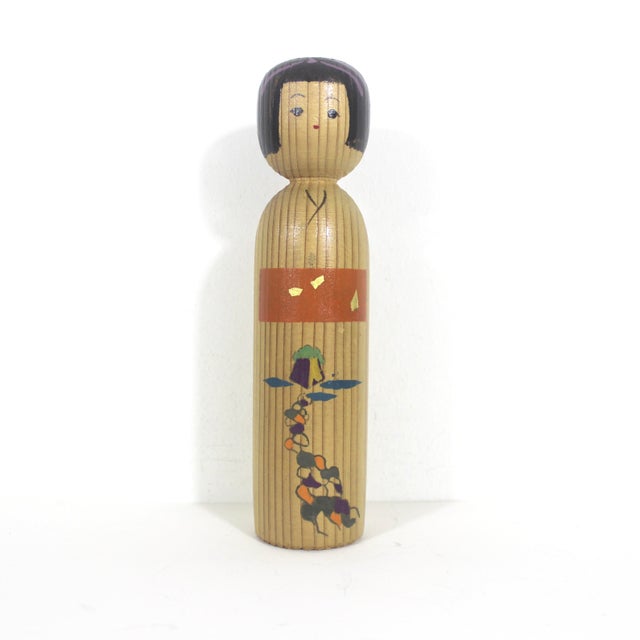 Gorgeous vintage Japanese Kokeshi doll. The wood has distinct grain and shows lovely patina. She is a beauty and very...
