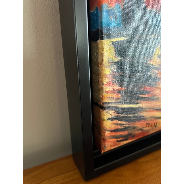 Bathed in the warm glow of a brilliant sunset, this original oil painting by Steve Schaaf captures a quiet harbor as...