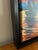 Bathed in the warm glow of a brilliant sunset, this original oil painting by Steve Schaaf captures a quiet harbor as...