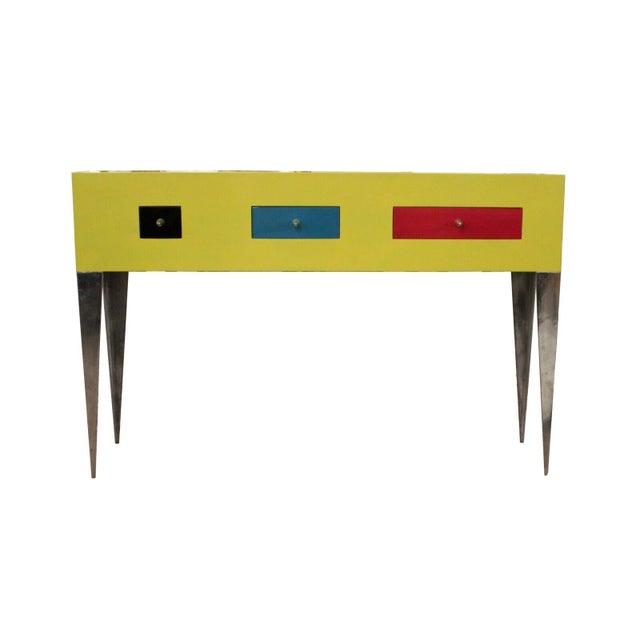 For your consideration is this funky Memphis Style yellow console table on brushed aluminum legs with three drawers...
