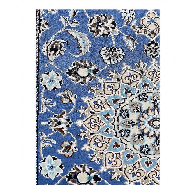 Beautiful hand-knotted Nain rug made from wool and silk. Nain is a small village located in central Persia that has...