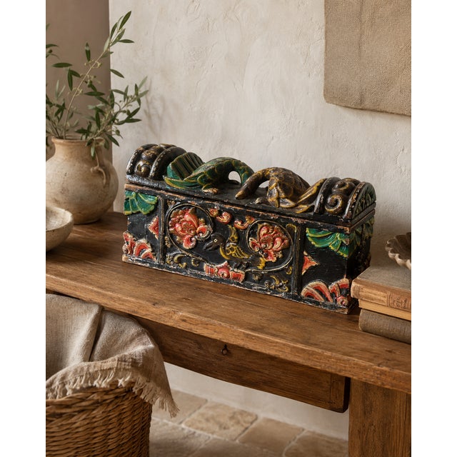 A wonderfully characterful antique Indian dowry box, richly carved and decorated in vibrant polychrome, dating to the late...