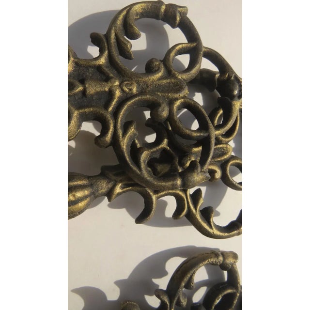 Set of six unused vintage finials. Cast metal with bronze finish. Measure 7" long, 3 3/4" wide, thread opening 1".