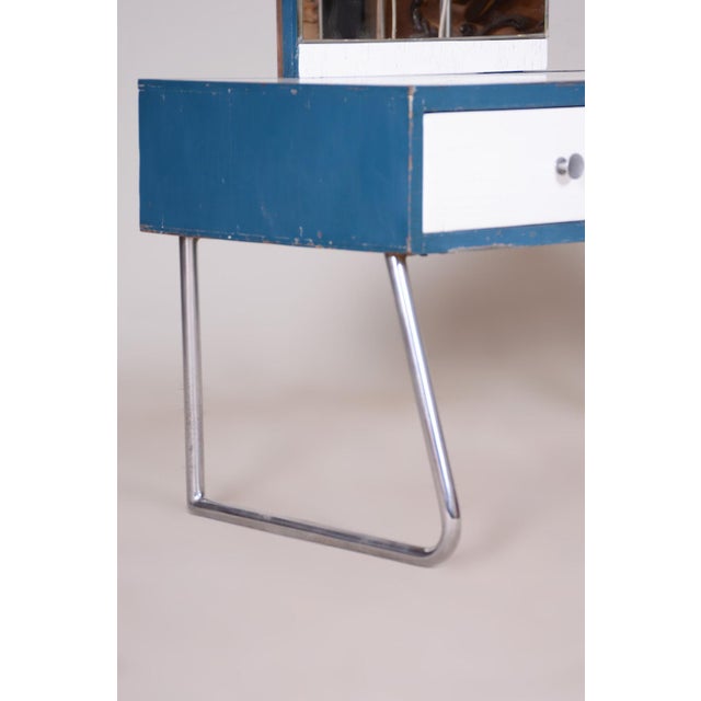 Made by Vichr & Co., a renowned Czech furniture manufacturer. In pristine original condition, the item has been...