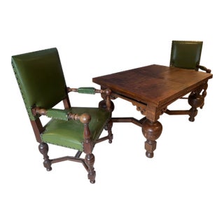 1920s Antique Renaissance Revival Oak Draw-Leaf Table With 2 Green Leather Armchairs - Set of 3 For Sale