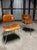 An iconic pair of Herman Miller Eames DCM molded plywood side chairs 1985-1999 (Signed). These chair’s beautiful design...