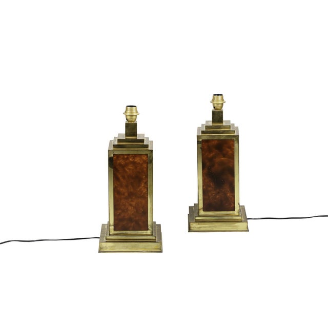 Pair of square shape lamps in bakelite, walnut burl imitation, and gilt brass. Top in stair shape and molded base. Work...