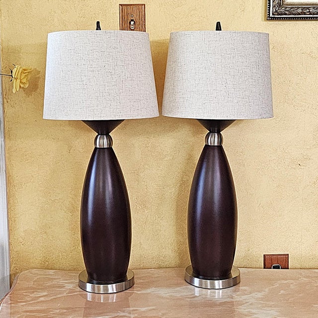 Pair of Contemporary Espresso Wood Hourglass Lamps With Brushed Nickel Accents and Linen Shades For Sale - Image 11 of 18