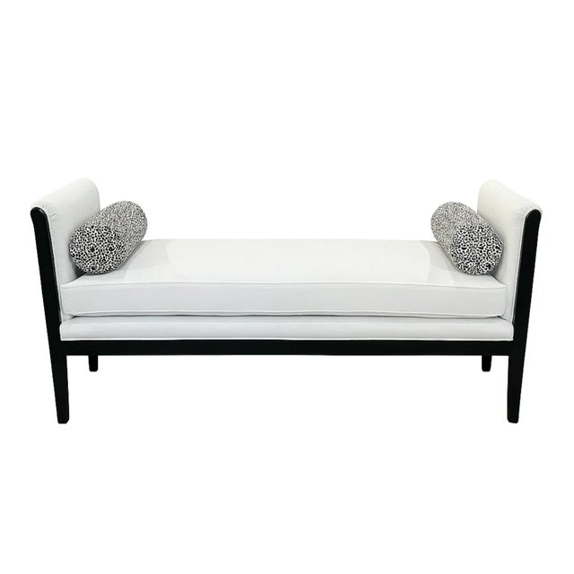 A refined blend of classic and contemporary, this custom French-inspired daybed features a sculptural black wood frame...