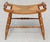 This charming vintage Hitchcock-style maple bench showcases classic American craftsmanship and timeless design....