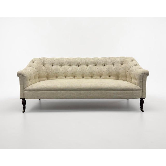 George Smith Somerville Sofa with a tufted back and straight seat in heathered tan/cream fabric on turned mahogany legs...