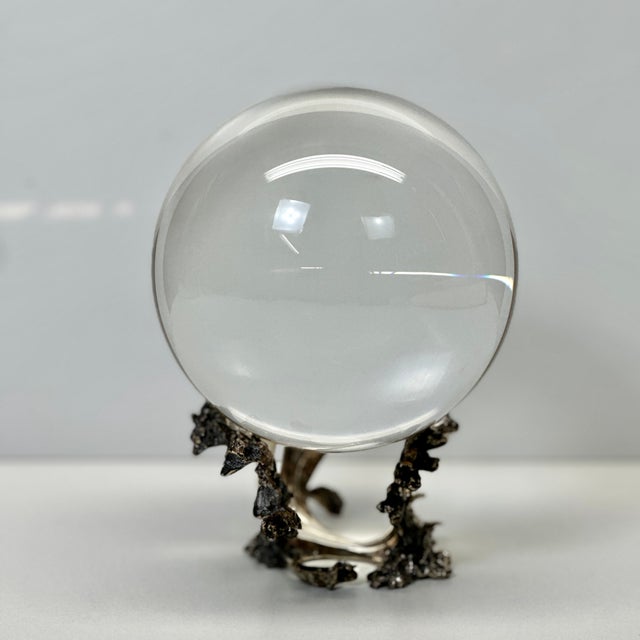 Rare Steuben Crystal Gazing Ball with Sterling Silver Wave Stand An elegant and highly collectible Steuben crystal gazing...