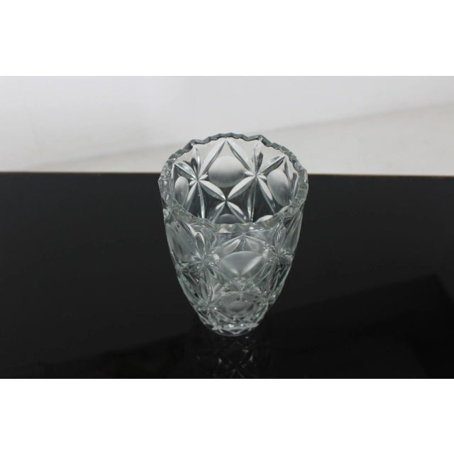 The vase made in Czechoslovakia of pure, grinder glass.