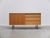 Beautiful compact sideboard designed by Helmut Magg for Deutsche Werkstätten around 1960. Made of a lighter ash wood with...