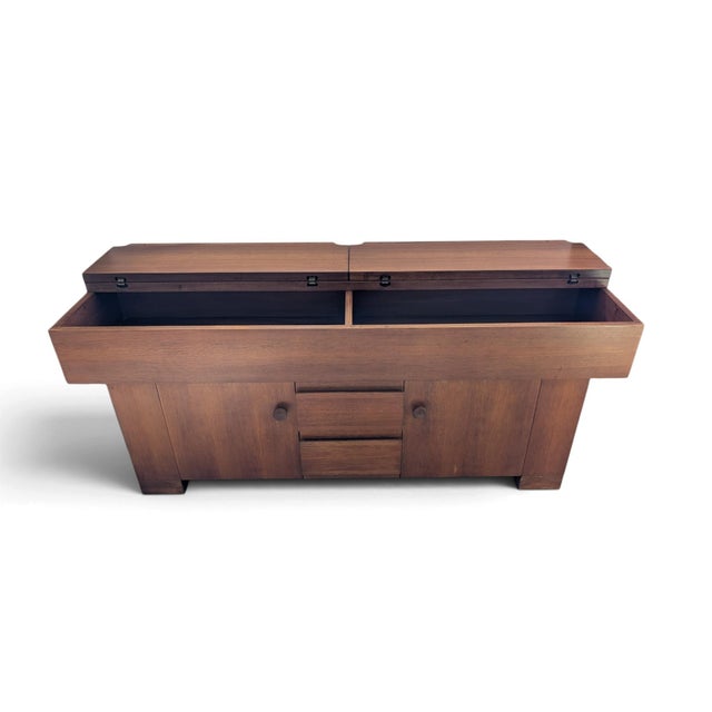 The "Torbecchia" sideboard, designed by Giovanni Michelucci in the 1960s and produced by Poltronova, is an iconic work of...