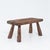 This rustic wooden bench was hand-crafted from pinewood. We date it back to the 1950s. The wood has a beautiful pattern...