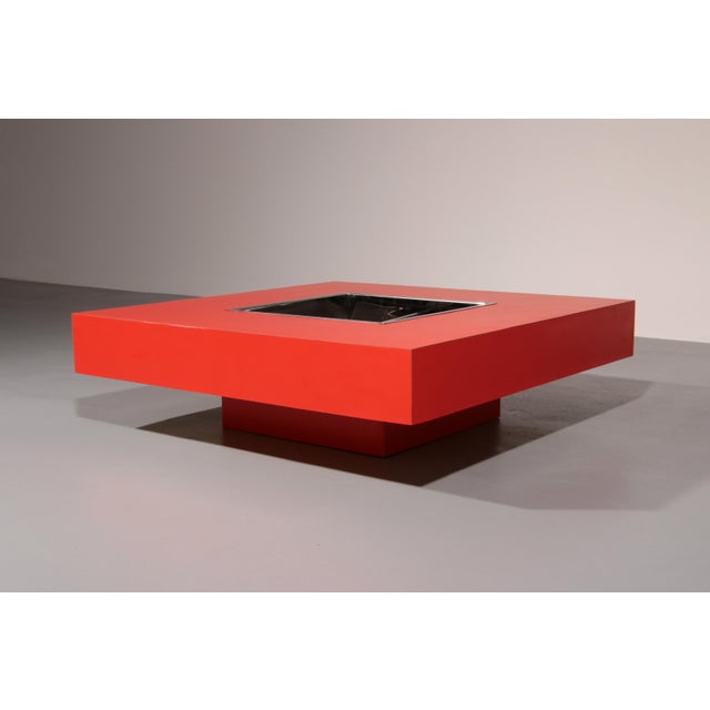 A striking and highly distinctive coffee table designed by in the 1970s. with its impressive 120 x 120 cm size, this...