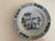 A striking companion pair of antique Chinese export blue-and-white porcelain plates, likely dating to the Qing dynasty,...