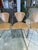 Set of 4 chairs; 2 identical sets are available for sale. In very good condition, both the leather and the chrome. Chairs...