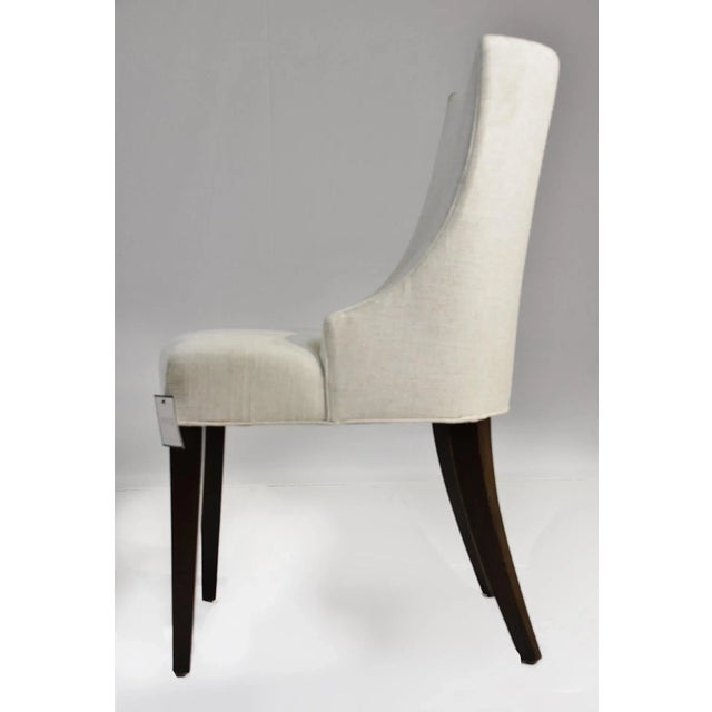 Le Jeune Upholstery "Emily Dining Chair" Showroom Model Offered for sale is a Le Jeune Upholstery EMILY DC 11 .923 Dining...