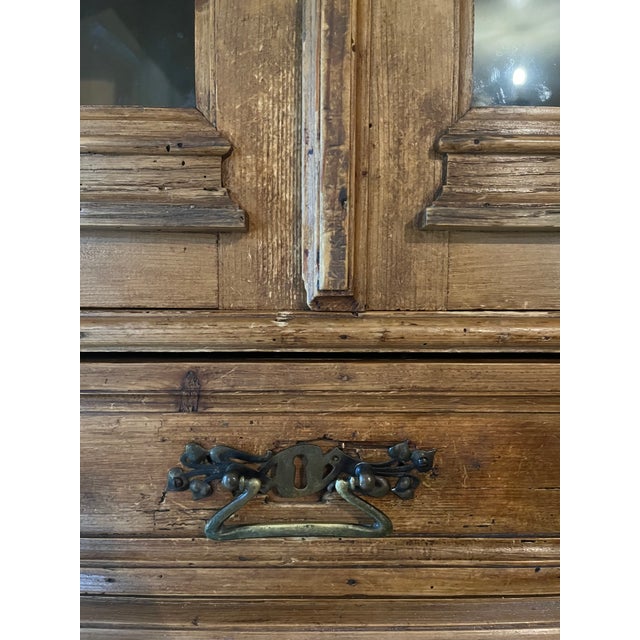 Impressive late 19th-century Central European pine sideboard with hutch, distinguished by bold architectural scale,...