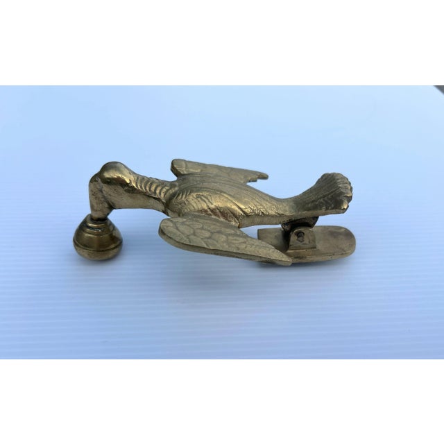 This solid brass antique knocker from Turkey is in the shape of a bird with the beak ending in the knocker. It mounts via...