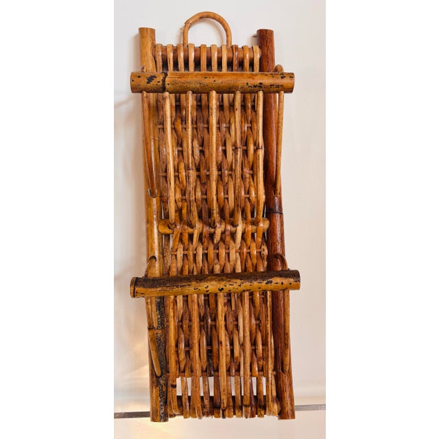 A nice addition to keep you organized in a traditional style. Made of bamboo & rattan. Great for a mudroom, entry or...