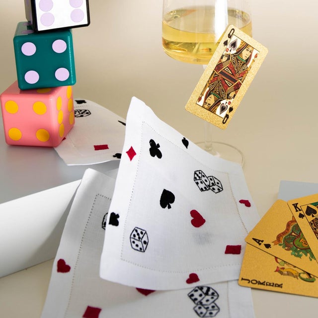 Embroidered by hand, 6in. x 6in. cocktail napkins. 100% pure linen with cotton thread. Machine wash on a gentle cycle. Lay...