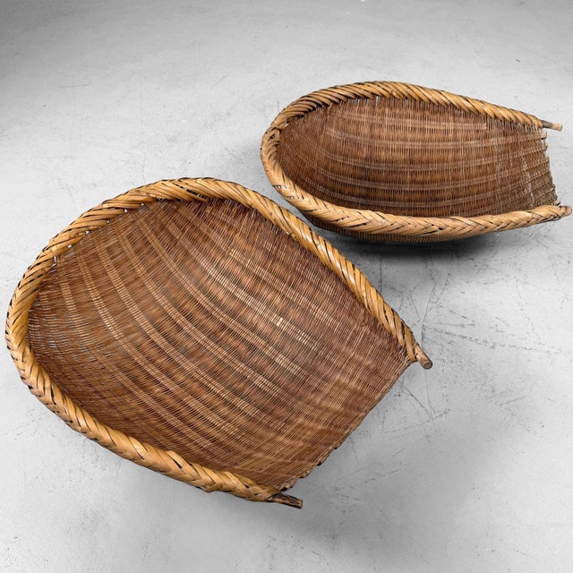 Set of two Japanese bamboo baskets, dating from circa 1950–1960, Shōwa period, Japan. The baskets are handwoven from fine...