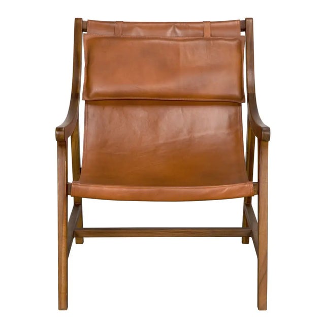 With its warm teak frame and supple leather finish, this chair isn’t just a piece of furniture—it’s an invitation to...